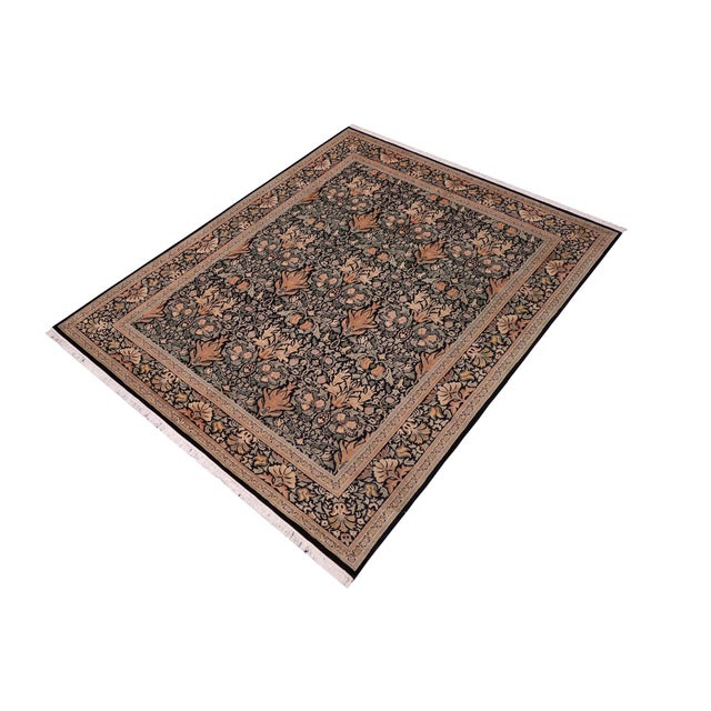 Designed with mesmerizing intricacy and gorgeous color palette, this hand-knotted masterpiece demonstrates the beauty and...