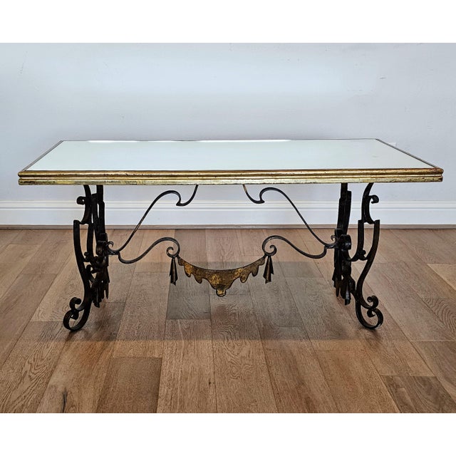 A rare and most impressive midcentury French parcel gilt ironwork base coffee table attributed / in the manner of...