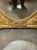 The 19th c. French Louis XVI Giltwood Mirror is a luxurious and elegant mirror with a stunning gold frame. Featuring Urns...