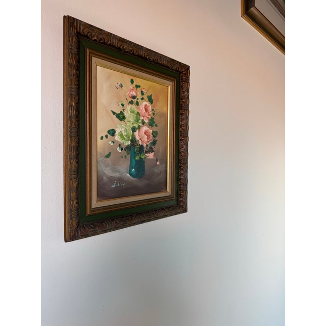 A charming 1970s vintage still life oil painting on canvas signed by the artist Bindi. This delicate composition features...