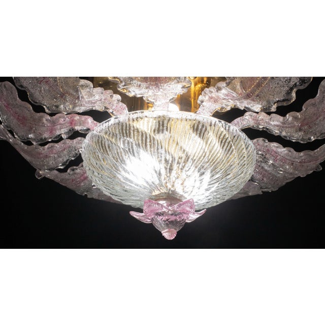 Elegant vintage Murano ceiling light with pink glass leaves and gold bath frame, perfect vintage condition. Height 40...