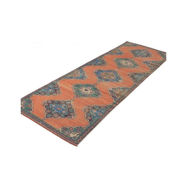 Decorative washed out handknotted vintage rug from Konya region of Turkey. Approximately 50-60 years old. In very good...