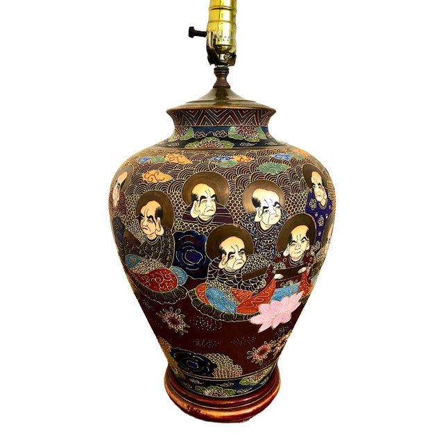 On offer is a pair of antique Japanese Satsuma vases converted into electric lamps. The vases are decorated with intricate...