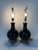 Elegant and timeless, this pair of 1980s Chapman table lamps features bold black glazed ceramic bodies with a sleek, high-...