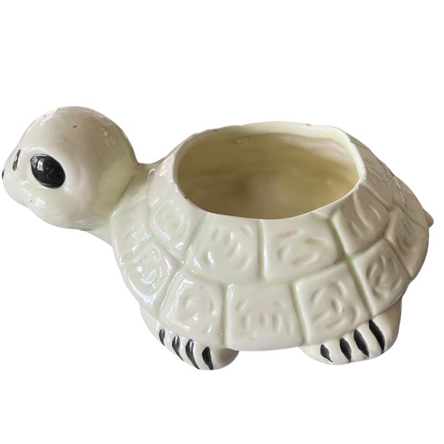 Charming and collectible, this vintage hand-painted ceramic turtle planter captures the playful spirit of mid-century...