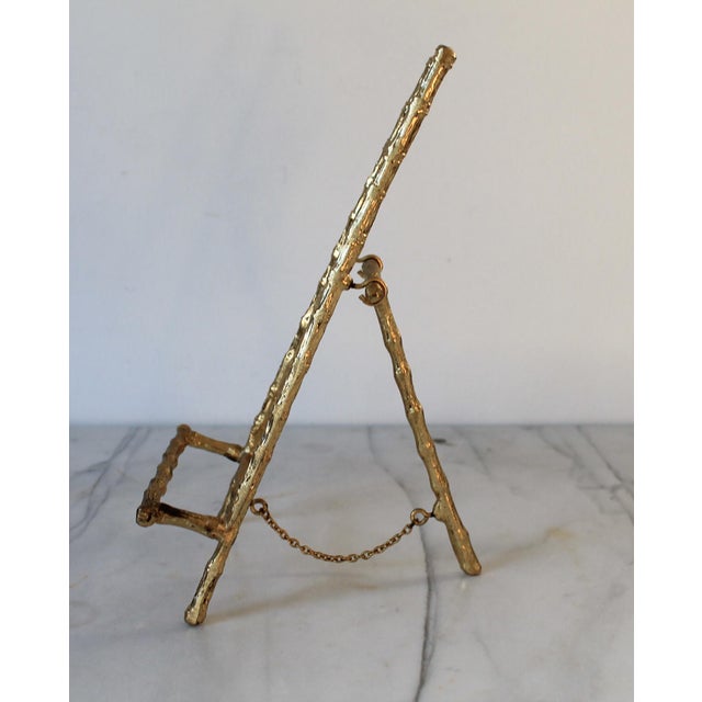Vintage brass faux bamboo picture easel. No makers mark. Some age wear to brass finish.