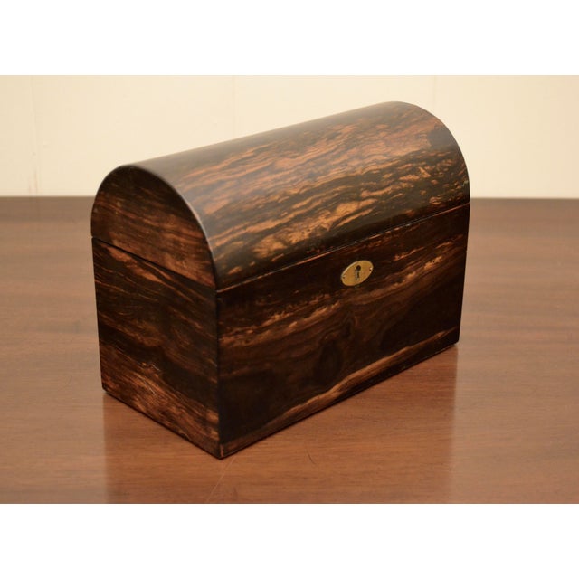 A fine Victorian coromandel wood tea caddy with domed top have two lidded compartments. Excellent 19th c craftsmanship,...