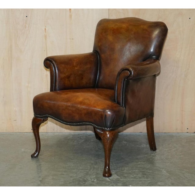 We are delighted to offer for sale this very well made pair of Antique Art Deco club armchairs, hand dyed this one of a...