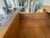 Here is a mid century cherry wood and white laminite top made by Stanley Furniture. There is a single drawer and an open...
