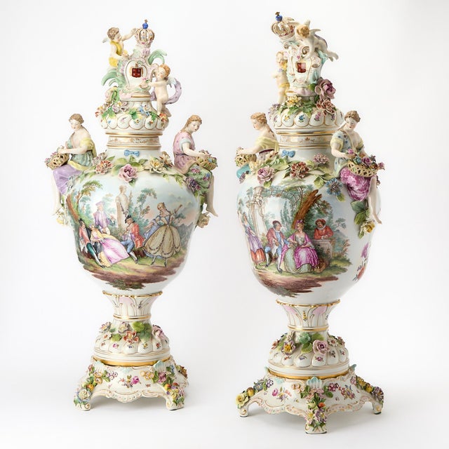 An impressive pair of monumental German porcelain lidded vases, dating to circa 1890 and attributed to the Dresden...