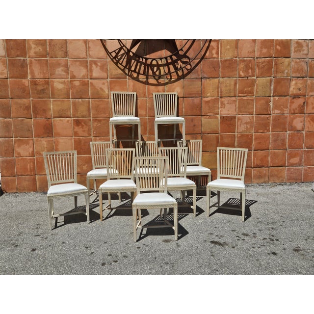 This is a Rare set of 10 Original Painted Swedish Gustavian side chairs. all seating has been restored and ready for the...