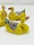 A set of four Chinese Export famille jaune porcelain duck-form brush rests, dating to the late 19th to early 20th century,...