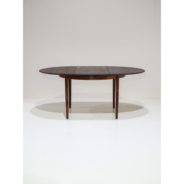 Rare extendable dining table produced by Skovby Møbelfabrik in Denmark, 1960s. This vintage round table is made of...