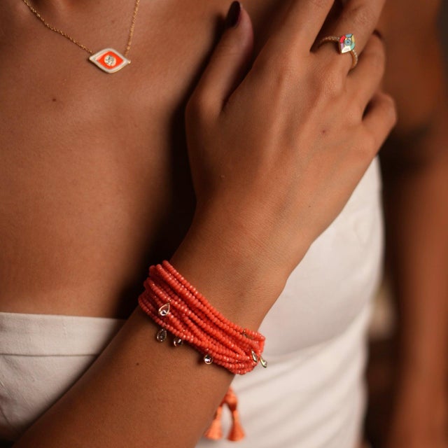 Embrace the perfect balance of energy and elegance with the Crystal & Diamond Multi Strand Adjustable Bracelet . This...