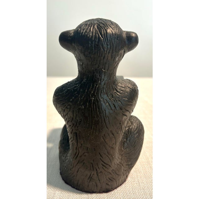 MCM Chopsticks for Andrea by Sadek cast iron monkey bookends featuring seated monkeys holding stacks of books in a...