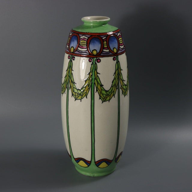 Minton Secessionist No.1 vase of stretched barrel-like form. Rare white ground with multi-coloured details version and...