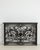 A neoclassical console table with a wrought iron frame and bluestone top. The design features clean lines with subtle...