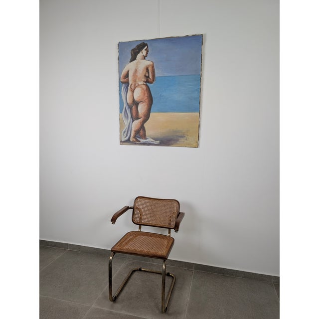 Large-format oil on canvas depicting a seated female figure on the beach, executed with a warm palette and loose,...