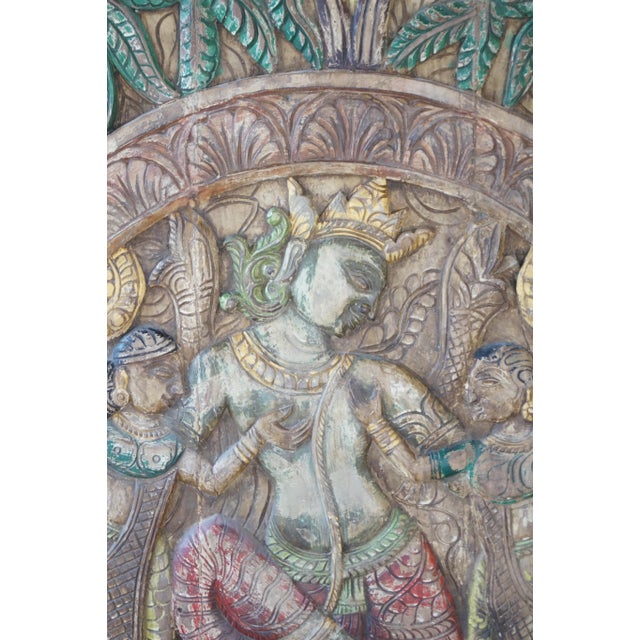 Celebrate divine artistry with this vibrant vintage Krishna carved panel, crafted in the traditional style of Indian...