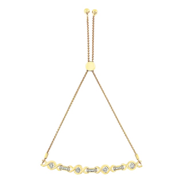 14K Yellow Gold Plated .925 Sterling Silver Channel Set Diamond Accent Twist 4���-10��� Adjustable Bolo Bracelet (I-J Color, I3 Clarity) For Sale