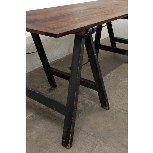 A striking ecclesiastical oak trestle table, with decorative engravings to the tabletop. Fabulous colour and patina to the...