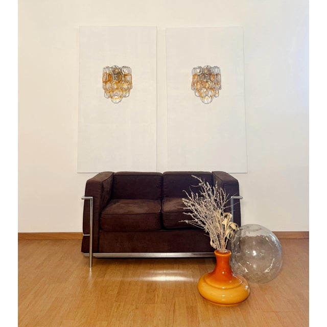 Pair of Vintage Italian Murano appliques in Vistosi style. Wall lights have 10 fantastic Murano amber and trasparent...