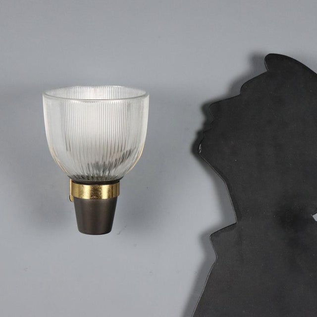 Important set of five wall lamps from the 1950s '60s in the style of Ignazio Gardella. They feature an elegant structure...