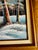 Original signed oil painting depicting a winter mountain landscape with snow-covered evergreens, a winding river, and...