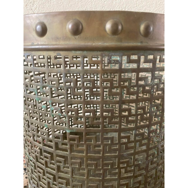 Vintage 1960's pierced brass cylinder shaped cache pot with geometric design and embossed stud accents on the top & bottom...