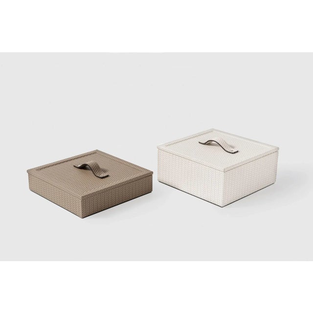 A celebration of minimalism and sophistication. Crafted with a wooden base, this pretty little trinket pot is entirely...