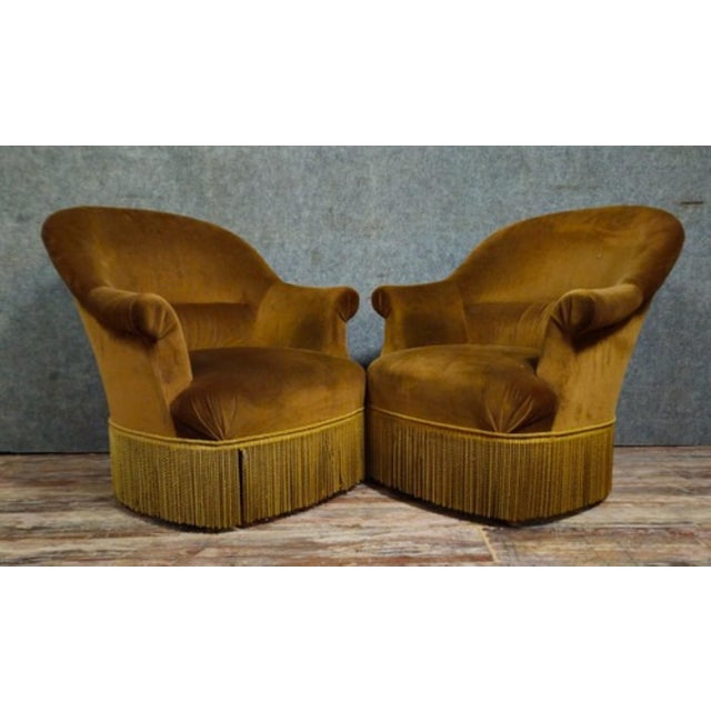 Pair of velvet toadstool armchairs, first half of the 20th century an elegant pair of toadstool armchairs with generous,...