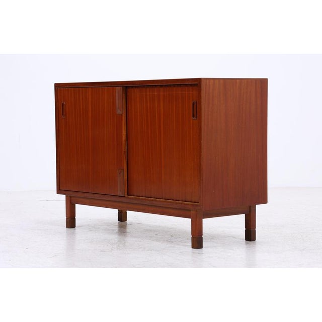 Mid-Century Mahogany Commode with Sliding Doors For Sale - Image 16 of 17