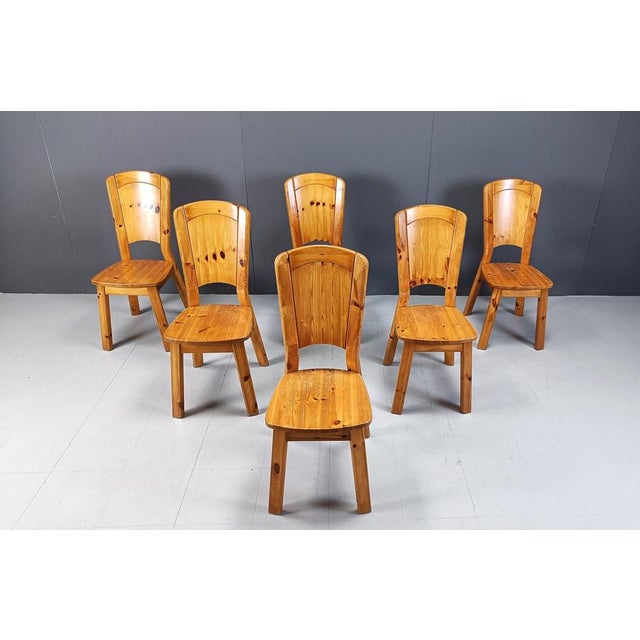 Vintage pine wood dining chairs in the style of Rainer Daumiller. Nice and solid chairs. Timeless and can be combined in...