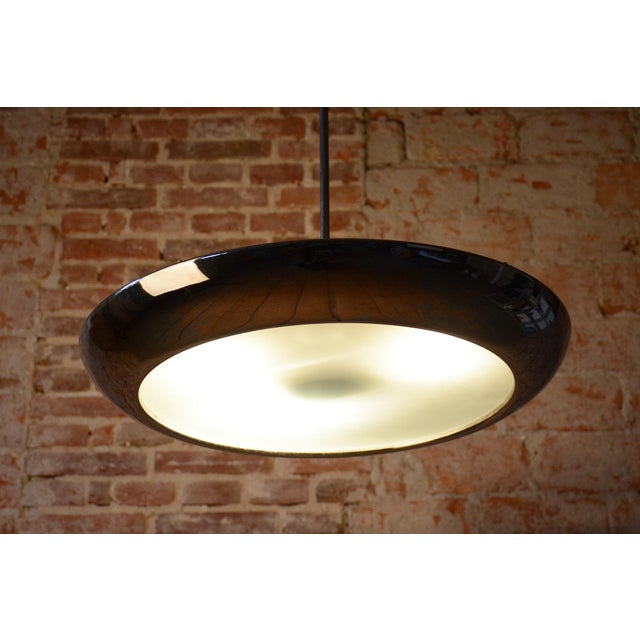 This iconic pendant, familiarly nicknamed UFO, is one of the most prominent lighting fixtures of Czechoslovak...