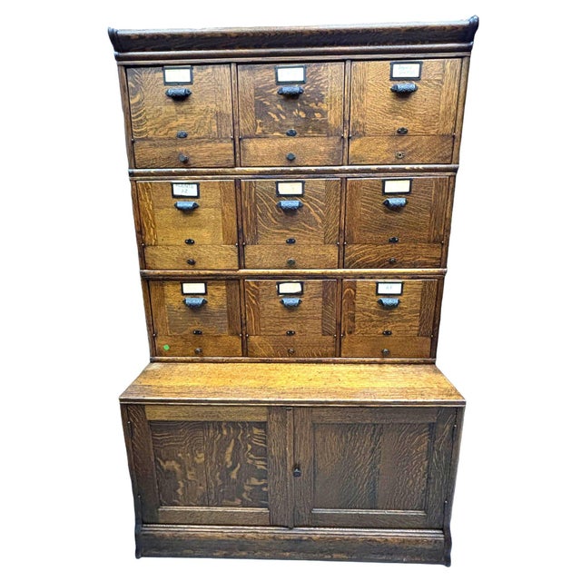 Early 20th-century American quarter-sawn oak sectional step-back filing cabinet like the ones popularized by makers such...