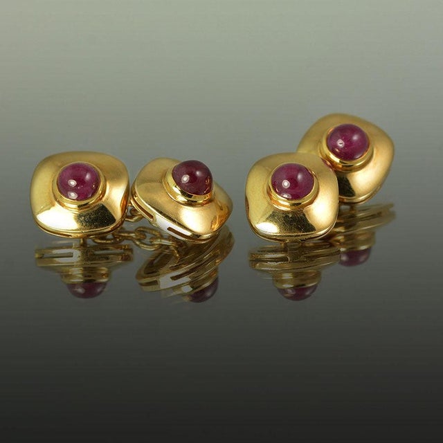 18K Cufflinks with 4 cabochon runies weighing 6.40 carats and 17.73 grams of 18k gold.