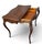 This 19th Century French Gabriel Legs Rosewood Inside Black Leather Game Table is a stunning piece of antique furniture....
