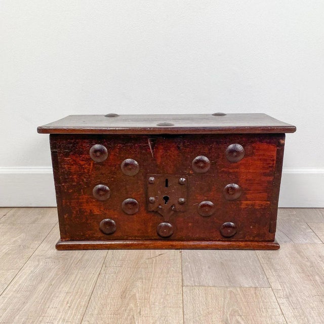 A Continental strong box, possibly Spanish, with iron decoration.