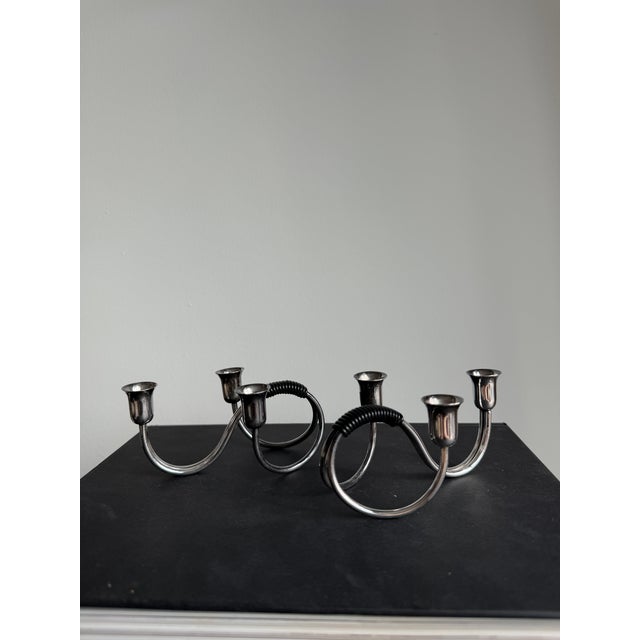 Pair of A vintage silver Danish three-armed candle holders by Carl F. Christiansen. In excellent condition with minimum...