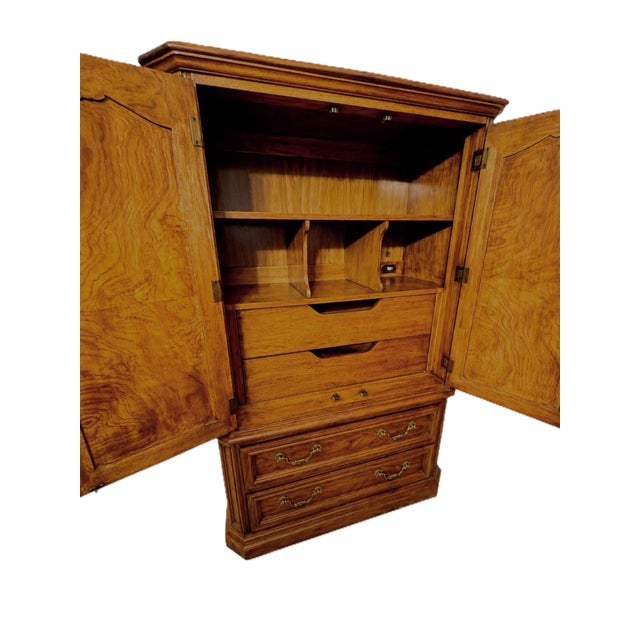Classic Thomasville Pageantry Collection small armoire with lovely burl accents on door panels. Rest of armoire is solid...