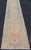 Measures: 2'8 x 13'. Turkish Oushak Runner in Soft Taupe with Faded Rose, Pale Blue, and Cream Accents. Keivan Woven Arts...