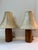 Pair of 1950s era turned teak table lamps. Paired with original bell shaped vinyl shades. Diminutive size, casts a soft...