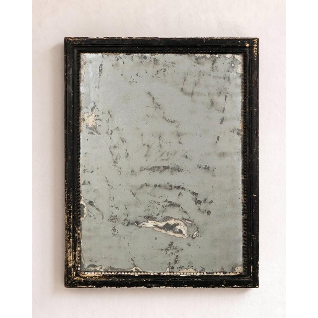 Late 19th century french antique mirror with black frame and beautifully foxed mirror glass. some mirrors reflect. Others...