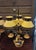 Pair of Empire-style three-light hot-water bottle lamps made of lacquered sheet metal with a candle snuffer A charming...