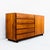 A remarkable mid century modern walnut credenza by Widdicomb, with grain patterns so figured it almost resembles rosewood....