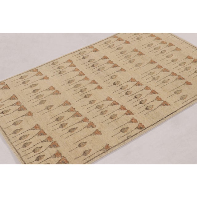 Hand-knotted in natural silk and wool, this 3x5 rug is a radiant and sophisticated addition to Rug & Kilim’s Block Print...