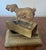 Antique 19th century French Charles X bronze hunting dog inkwell retrieving a bird in his mouth. The dog stands atop a...