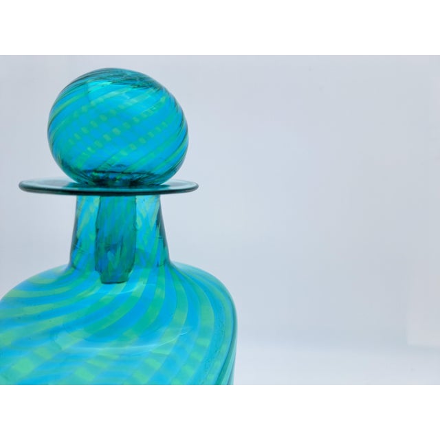 Add a touch of authentic Venetian art to your home with this stunning bottle, a unique design piece combining vibrant...