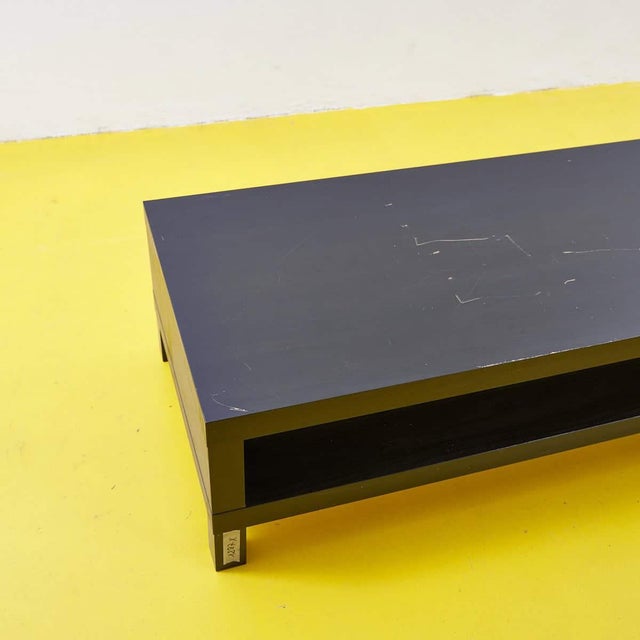 This elegant dark wood coffee table celebrates contemporary minimalist design. with a clean, linear structure, the table...