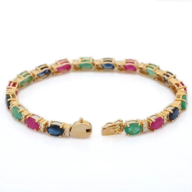 15.01 Ct Emerald, Ruby and Blue Sapphire Tennis Bracelet in 14k Yellow Gold For Sale In New York - Image 6 of 13